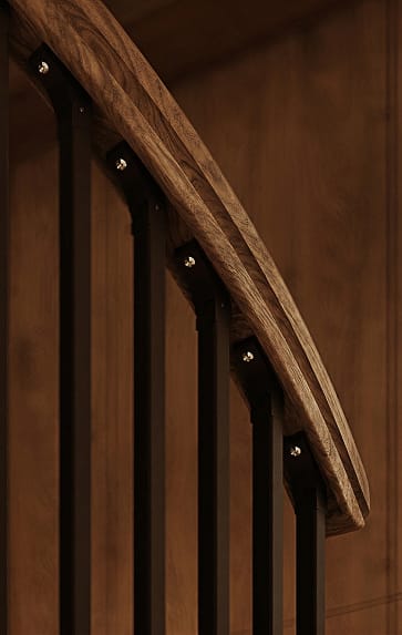 American Industrial spiral staircase wood handrail detail