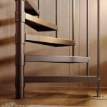 Half Turn spiral staircase in a bronze finish, tread and center pole detail