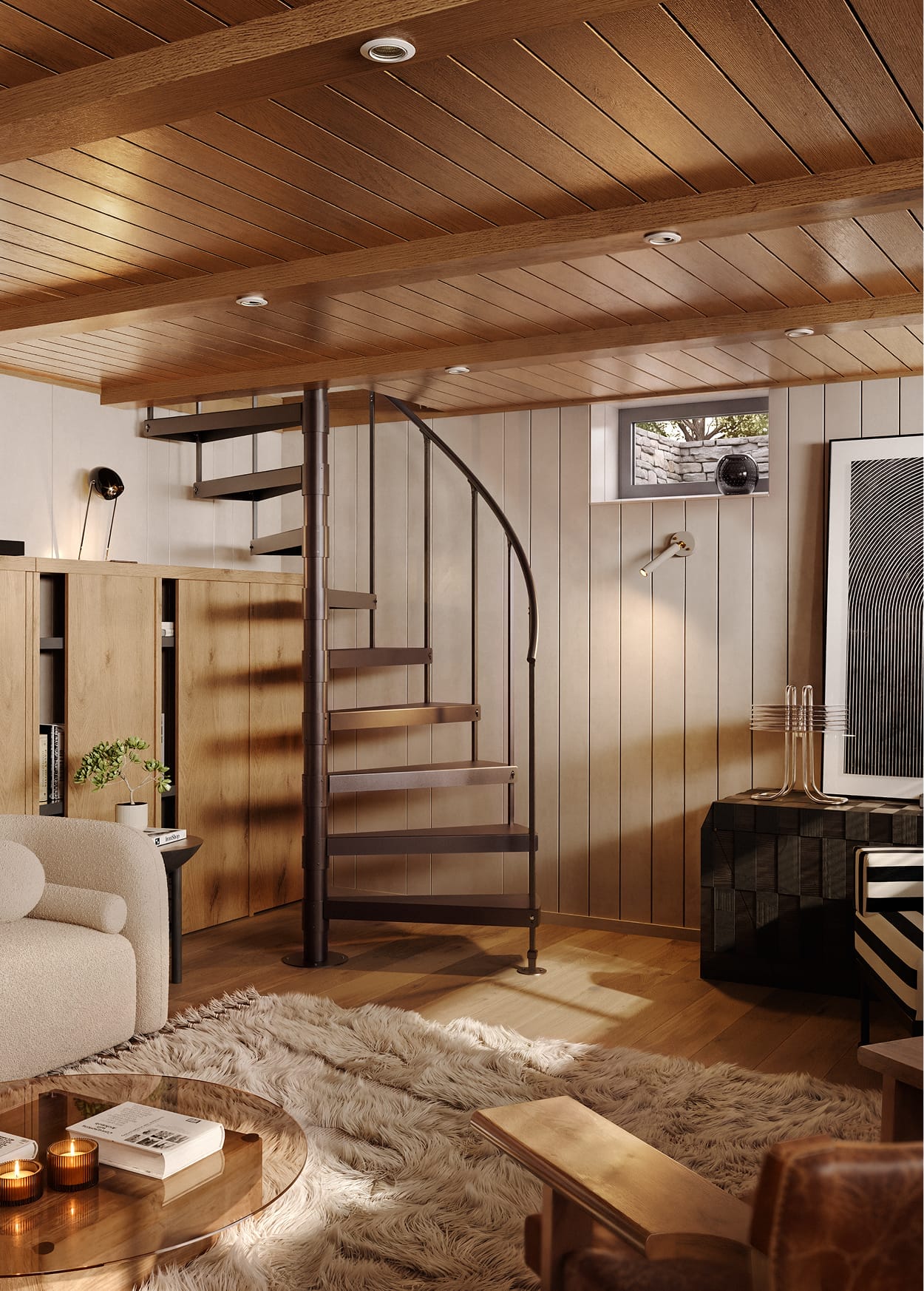 Half Turn spiral staircase in a bronze finish inside a wood-paneled den with a loft