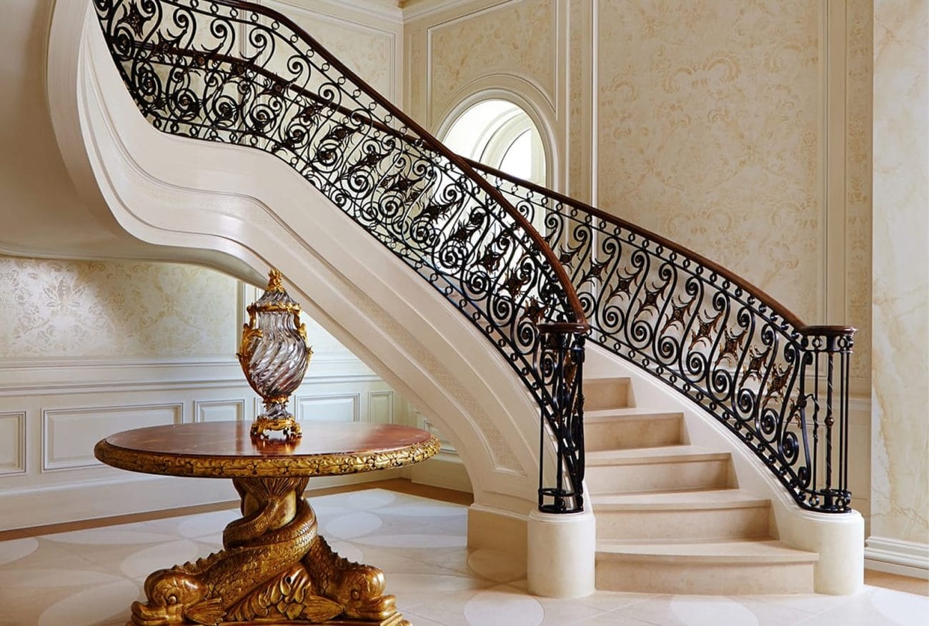 Ornament custom staircase in a grand entryroom