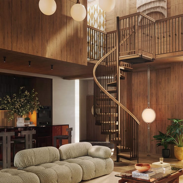 Compact wood and metal spiral staircase connecting a loft to a wood-paneled living room with a plush sofa and warm pendant lighting